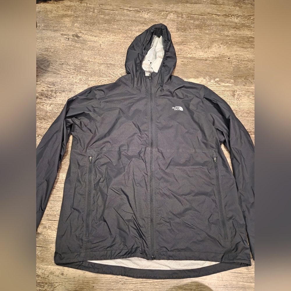The North Face Mens 2XL flight series running windbreaker with tear on arm